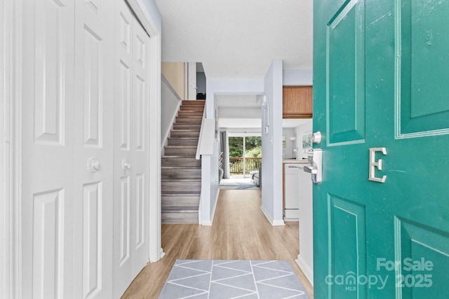 9606 Vinca Cir Unit E, Charlotte, NC 28213 - entrance foyer with light wood-type flooring and stairs