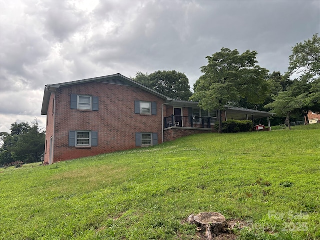 356 Lucky Hollow Rd, Hickory, NC 28601 - view of side of property featuring brick siding and a yard
