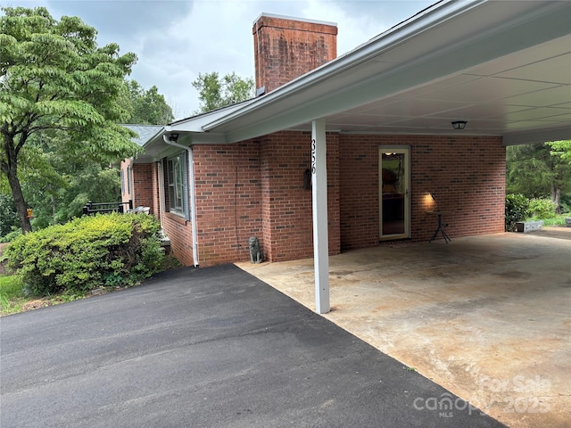 356 Lucky Hollow Rd, Hickory, NC 28601 - view of patio / terrace with driveway and a carport