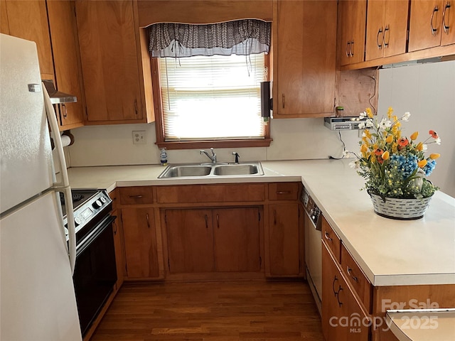 356 Lucky Hollow Rd, Hickory, NC 28601 - kitchen featuring freestanding refrigerator, black range, light countertops, brown cabinetry, and dark wood finished floors