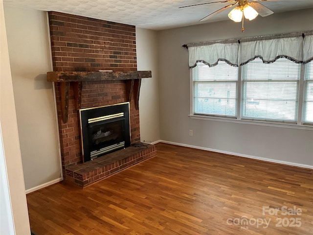 356 Lucky Hollow Rd, Hickory, NC 28601 - unfurnished living room featuring wood finished floors, ceiling fan, and plenty of natural light