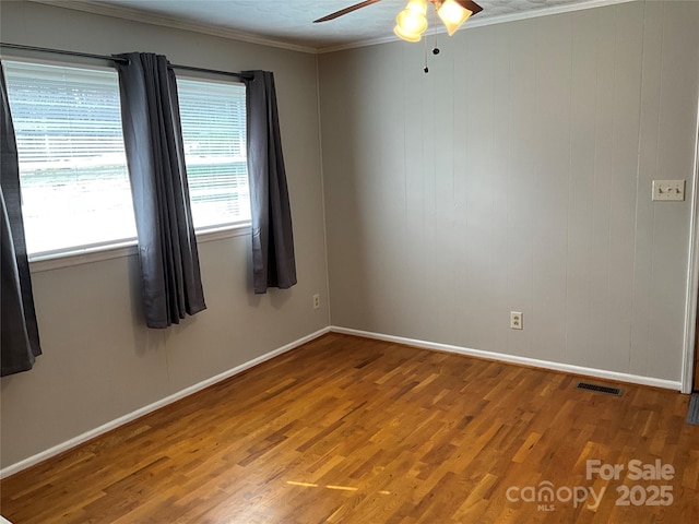 356 Lucky Hollow Rd, Hickory, NC 28601 - spare room featuring a ceiling fan, wood finished floors, and crown molding