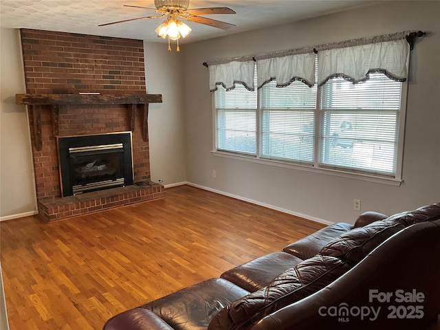 356 Lucky Hollow Rd, Hickory, NC 28601 - living area with a ceiling fan, wood finished floors, and a fireplace