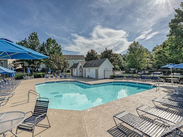 12131 Honor Guard Ave, Charlotte, NC 28277 - community pool with a patio area