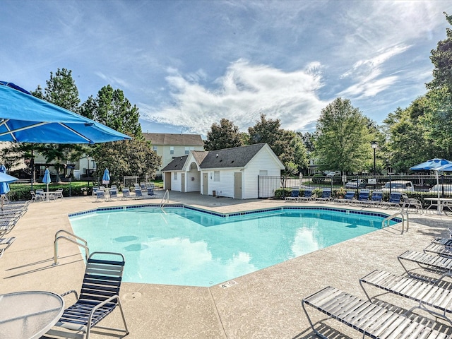12131 Honor Guard Ave, Charlotte, NC 28277 - community pool with a patio area