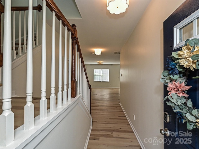 12131 Honor Guard Ave, Charlotte, NC 28277 - corridor with stairway and wood finished floors