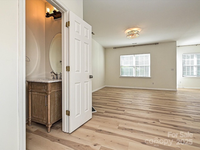 12131 Honor Guard Ave, Charlotte, NC 28277 - bathroom featuring vanity, wood finished floors, and healthy amount of natural light