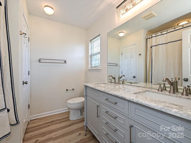 12131 Honor Guard Ave, Charlotte, NC 28277 - full bath featuring wood finished floors and double vanity