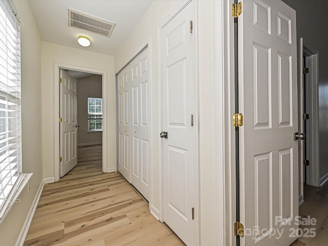 12131 Honor Guard Ave, Charlotte, NC 28277 - hallway with light wood-style flooring and baseboards