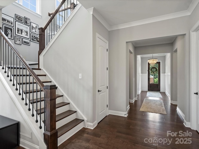 822 River Oaks Ln, Charlotte, NC 28226 - foyer entrance with dark wood-style floors, stairs, and ornamental molding