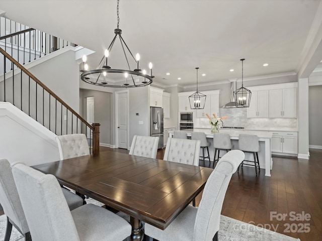 822 River Oaks Ln, Charlotte, NC 28226 - dining area featuring a chandelier, recessed lighting, dark wood finished floors, stairway, and crown molding