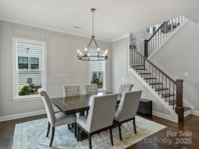 822 River Oaks Ln, Charlotte, NC 28226 - dining area with a chandelier, stairway, and wood finished floors
