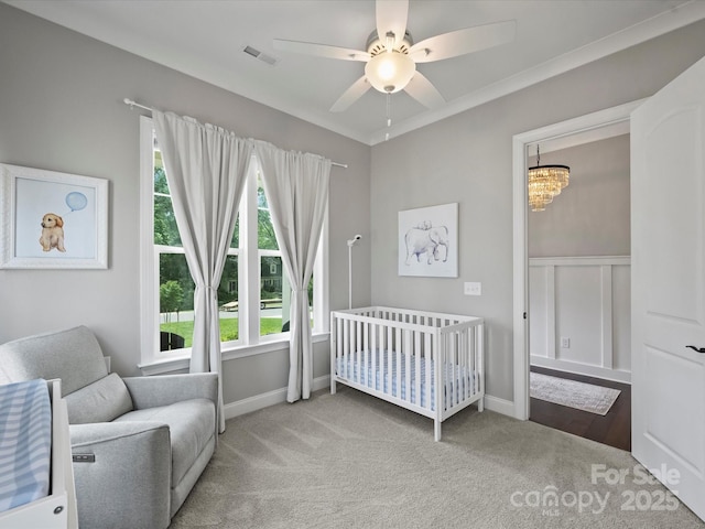 822 River Oaks Ln, Charlotte, NC 28226 - carpeted bedroom featuring a chandelier, a nursery area, and a ceiling fan