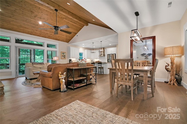 321 Middle Connestee Trl, Brevard, NC 28712 - dining area with a ceiling fan, wood finished floors, beam ceiling, high vaulted ceiling, and recessed lighting