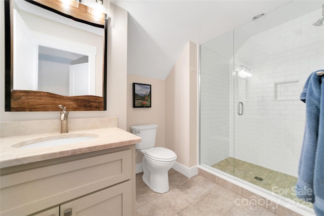 321 Middle Connestee Trl, Brevard, NC 28712 - bathroom featuring vanity, a shower stall, vaulted ceiling, and tile patterned flooring