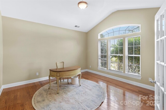 1119 Williamstown Rd, Matthews, NC 28105 - office featuring lofted ceiling, plenty of natural light, and wood finished floors
