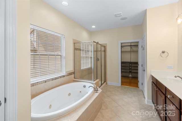 1119 Williamstown Rd, Matthews, NC 28105 - full bathroom with a stall shower, vanity, and a jetted tub