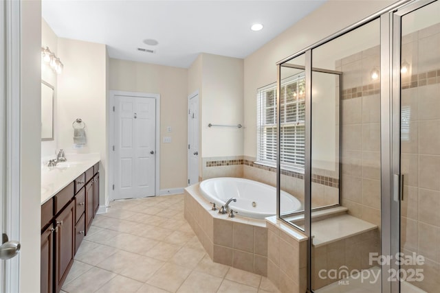 1119 Williamstown Rd, Matthews, NC 28105 - bathroom with vanity, a whirlpool tub, a shower stall, and tile patterned flooring