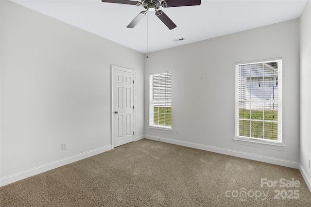 1119 Williamstown Rd, Matthews, NC 28105 - unfurnished room with light carpet and a ceiling fan