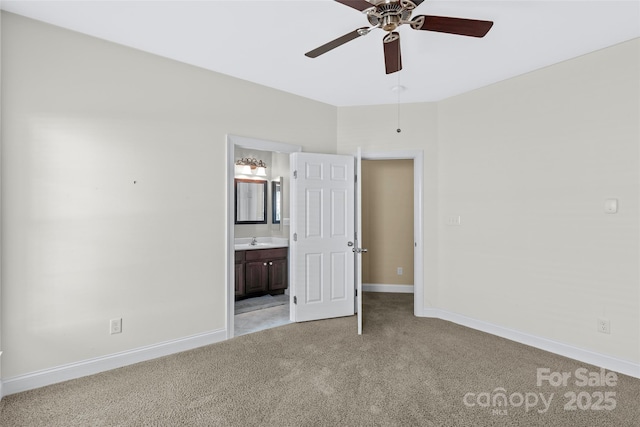 1119 Williamstown Rd, Matthews, NC 28105 - unfurnished bedroom featuring light colored carpet, ensuite bathroom, and ceiling fan