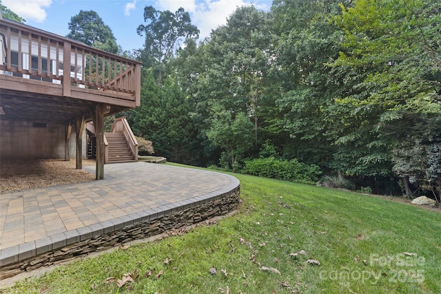 1119 Williamstown Rd, Matthews, NC 28105 - view of grassy yard featuring a patio, stairs, and a deck