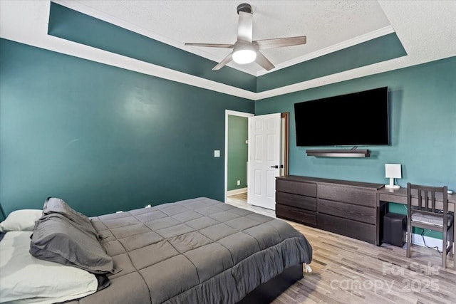 124 Turning Leaf Ln, Statesville, NC 28677 - bedroom featuring a textured ceiling, wood finished floors, crown molding, and a ceiling fan