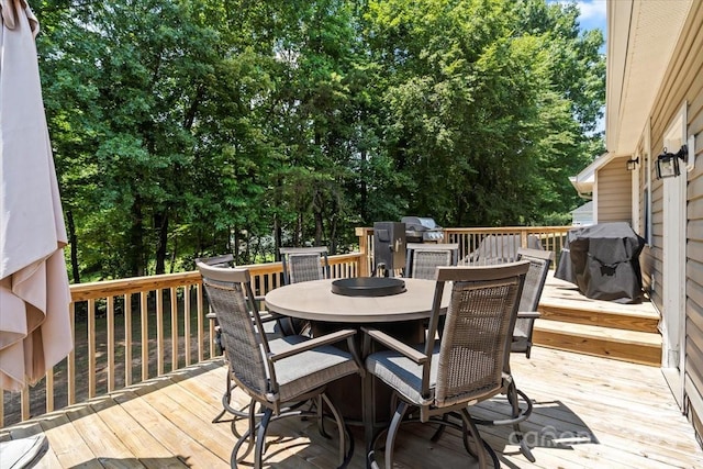 124 Turning Leaf Ln, Statesville, NC 28677 - wooden deck featuring outdoor dining space, area for grilling, and view of scattered trees