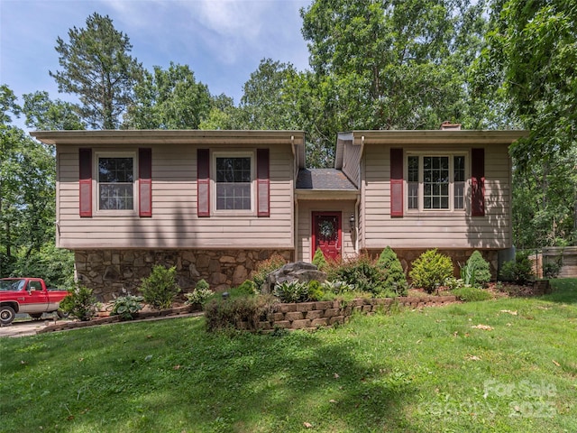 623 Nellie John Dr, Clyde, NC 28721 - view of front of property with stone siding, a front yard, and a chimney