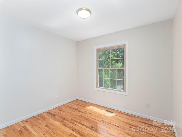 623 Nellie John Dr, Clyde, NC 28721 - empty room with light wood-type flooring and baseboards