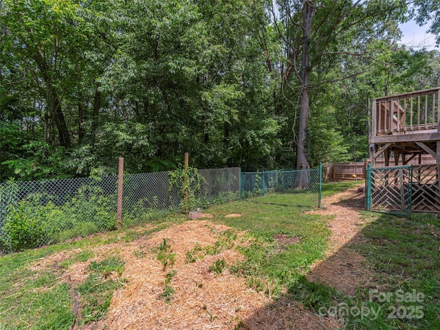 623 Nellie John Dr, Clyde, NC 28721 - fenced backyard with a wooden deck