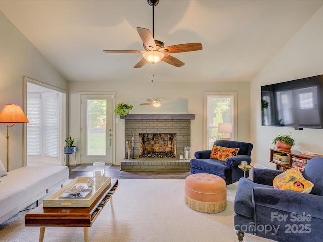 116 Hallett St, Fort Mill, SC 29715 - living area with vaulted ceiling, ceiling fan, and a brick fireplace