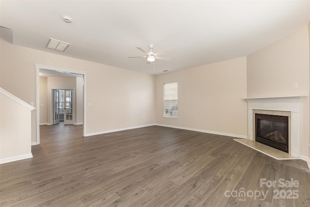 5307 Ayers Orchard Way, Charlotte, NC 28227 - unfurnished living room featuring ceiling fan, wood finished floors, a fireplace, and stairway