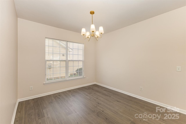 5307 Ayers Orchard Way, Charlotte, NC 28227 - spare room featuring a chandelier and dark wood-style floors