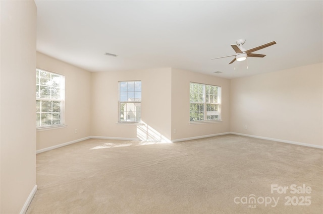 5307 Ayers Orchard Way, Charlotte, NC 28227 - spare room featuring plenty of natural light, light carpet, and a ceiling fan