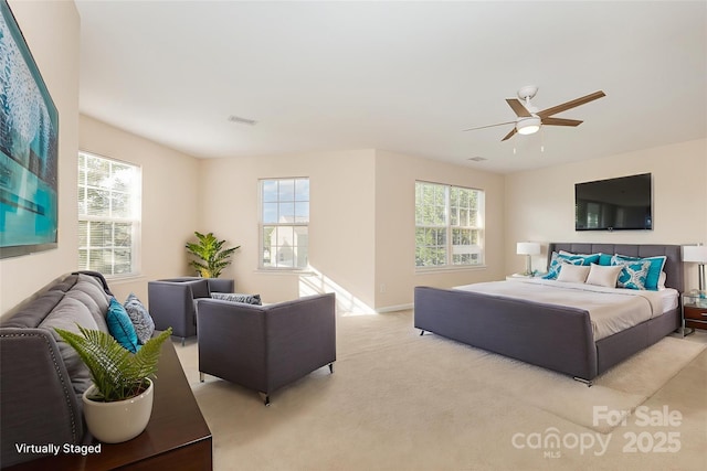 5307 Ayers Orchard Way, Charlotte, NC 28227 - bedroom featuring light carpet, multiple windows, and ceiling fan