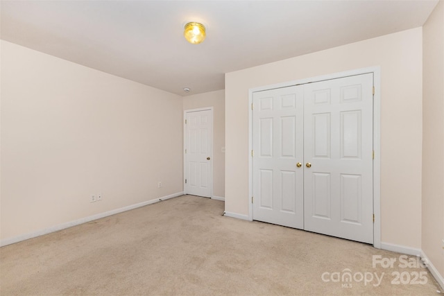 5307 Ayers Orchard Way, Charlotte, NC 28227 - unfurnished bedroom featuring carpet floors and a closet