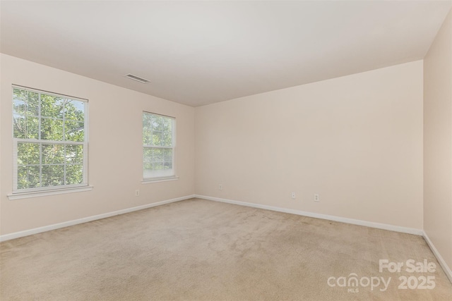 5307 Ayers Orchard Way, Charlotte, NC 28227 - spare room featuring light carpet and baseboards