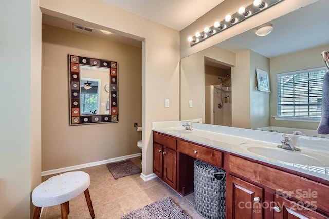 10132 Caldwell Depot Rd, Cornelius, NC 28031 - full bath featuring double vanity, tile patterned flooring, and a shower