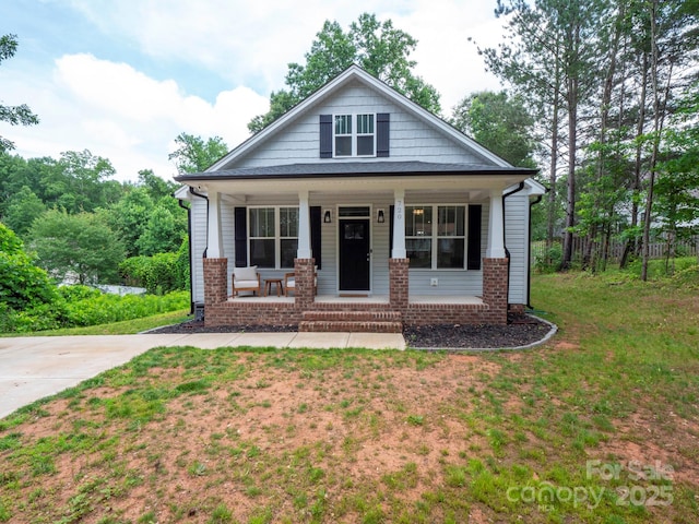 720 4th St, Stanley, NC 28164 - view of front facade featuring a porch and a front yard