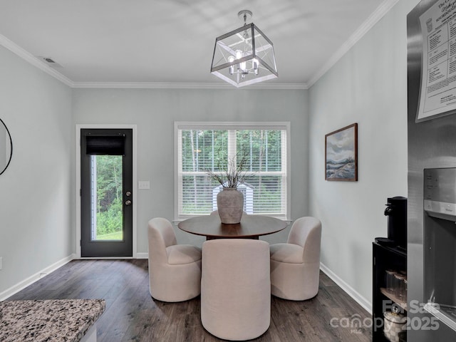 720 4th St, Stanley, NC 28164 - dining area with a chandelier, ornamental molding, and wood finished floors