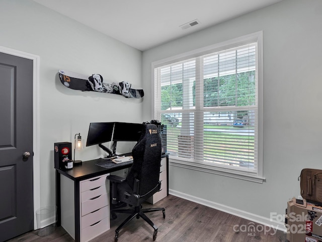 720 4th St, Stanley, NC 28164 - office space featuring dark wood-style flooring and baseboards