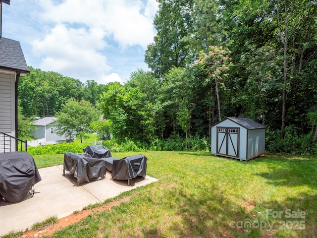 720 4th St, Stanley, NC 28164 - view of grassy yard with a patio, a shed, and a forest view