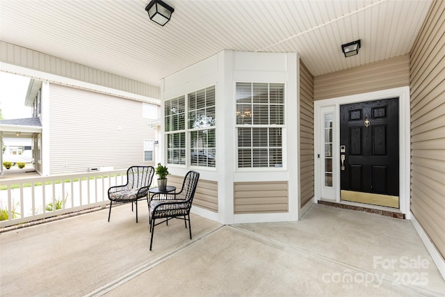 1040 Stonedown Ln, Matthews, NC 28104 - doorway to property featuring a porch