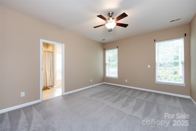 1040 Stonedown Ln, Matthews, NC 28104 - spare room with ceiling fan and light carpet
