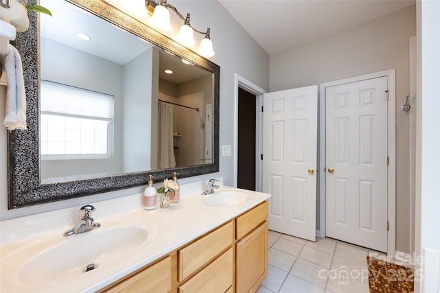 1040 Stonedown Ln, Matthews, NC 28104 - bathroom featuring double vanity and tile patterned floors