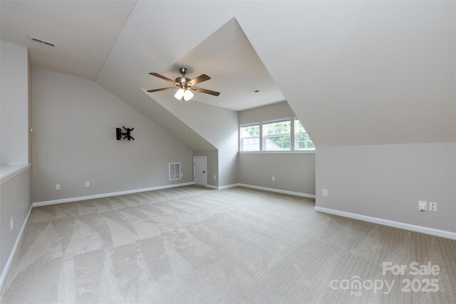 1040 Stonedown Ln, Matthews, NC 28104 - bonus room featuring vaulted ceiling, light colored carpet, and ceiling fan