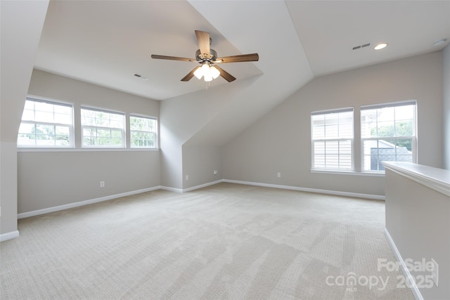 1040 Stonedown Ln, Matthews, NC 28104 - bonus room featuring light colored carpet, ceiling fan, and vaulted ceiling