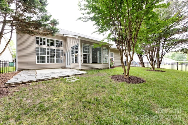 1040 Stonedown Ln, Matthews, NC 28104 - back of property with a patio area and a sunroom
