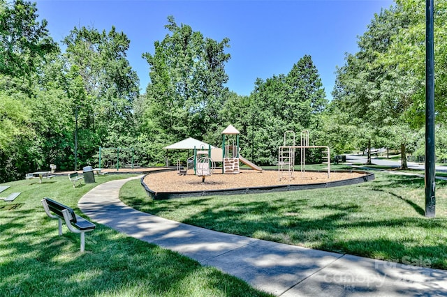 1040 Stonedown Ln, Matthews, NC 28104 - community playground featuring a lawn