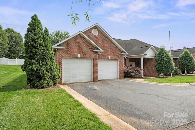 104 Mooreland Dr NE, Conover, NC 28613 - traditional-style house with brick siding, driveway, and a garage